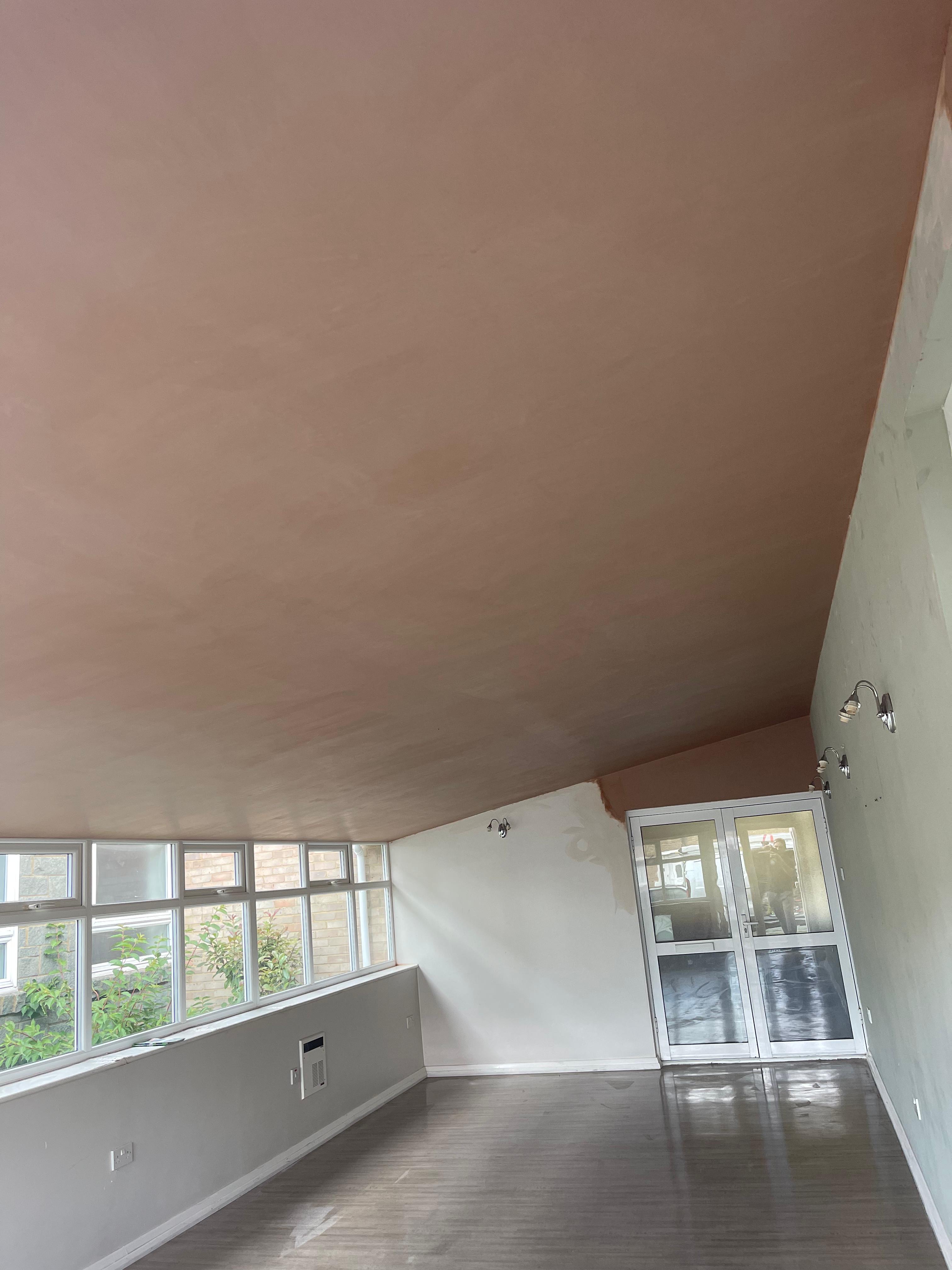Extension plastering — angled ceiling fully skimmed