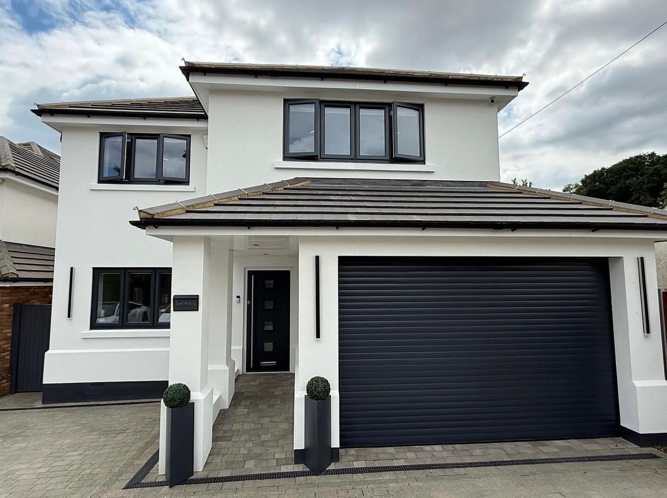 Completed exterior silicone rendering — semi-detached house